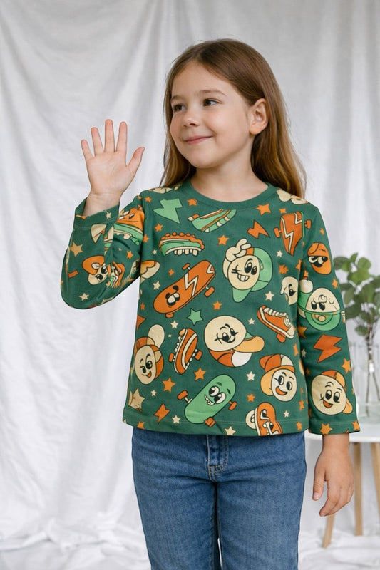 Horcun Clothing Brand green long sleeve t-shirt with all-over cartoon skateboard and character print for kids.