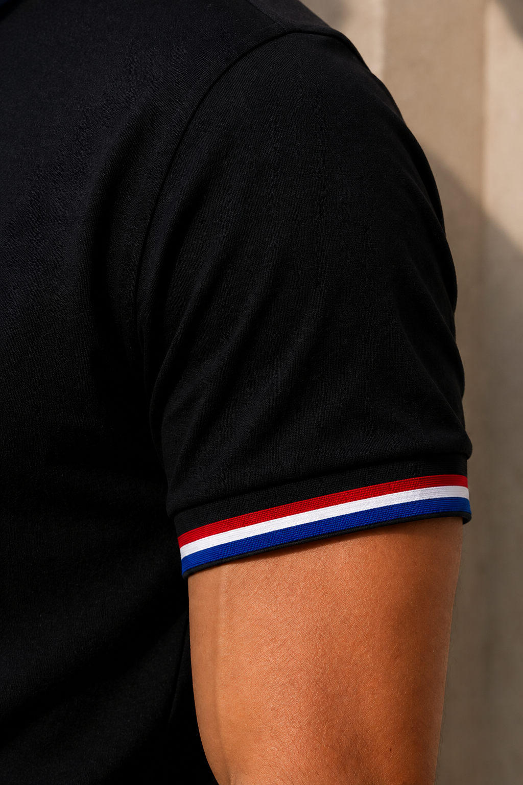 Men’s Black Polo T-Shirt with Red, White & Blue Striped Collar and Embroidered Logo