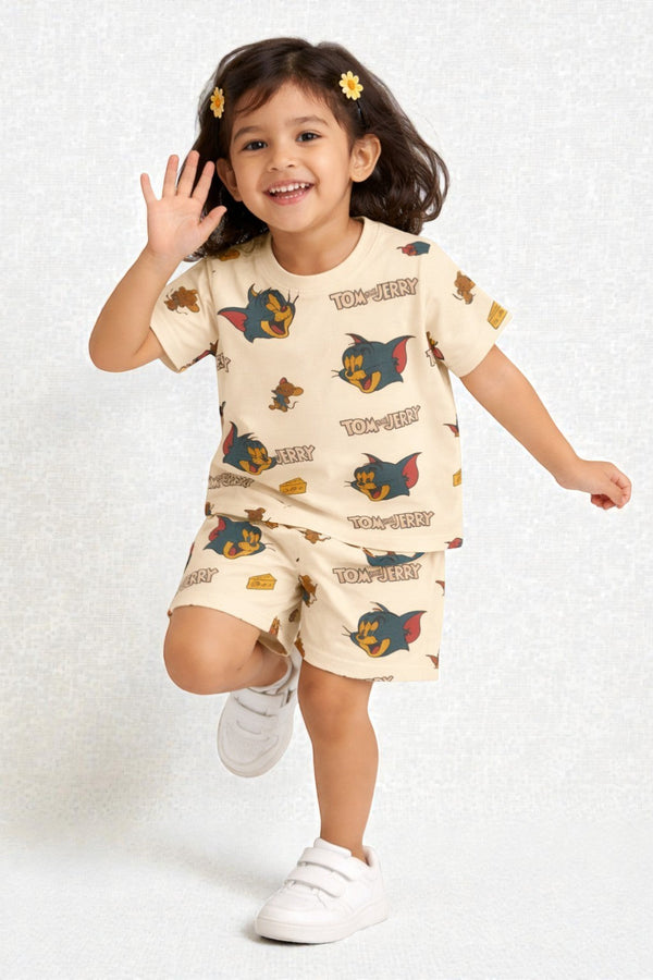 Horcun Clothing Brand cream cotton Tom and Jerry pajama set with all-over graphic print of Tom, Jerry, and cheese.