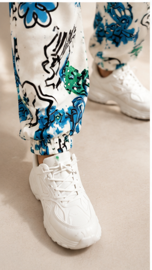 Women White Graffiti Printed Joggers – Stylish Casual Lounge & Streetwear Pants