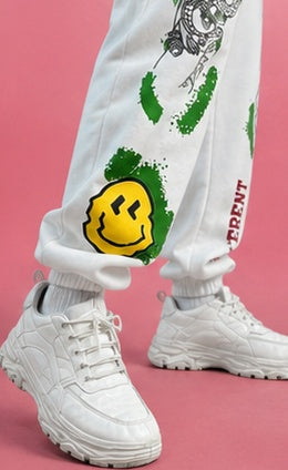 Women White Graphic Printed Joggers – Stylish Casual Streetwear & Lounge Pants